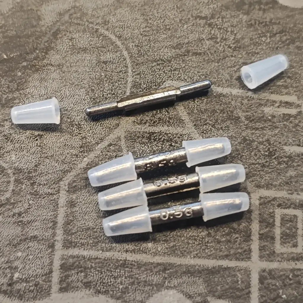 [99] Forellengrund Tungsten Stecksinker 4 Stück (0,5g)